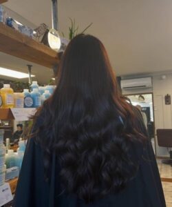 Soft waves finished after Davines treatment for smooth, touchable hair in Wollaton